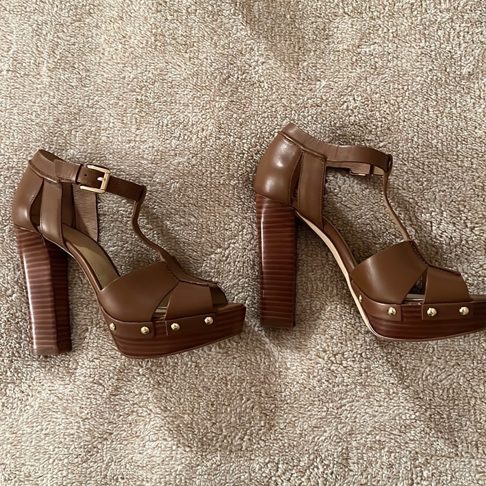 Michael Kors SZ brown high heel sandals with gold grommet detailing. Never worn